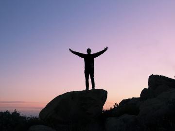 Man standing on rock