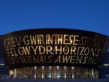 Image of Wales Millennium Centre theatre building with a blue sky