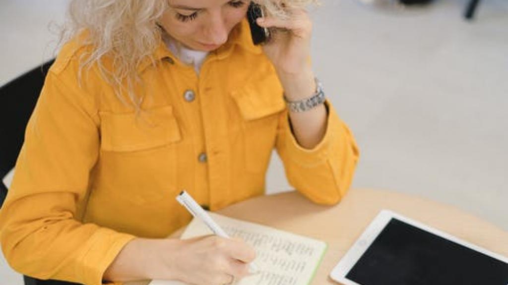 woman making notes