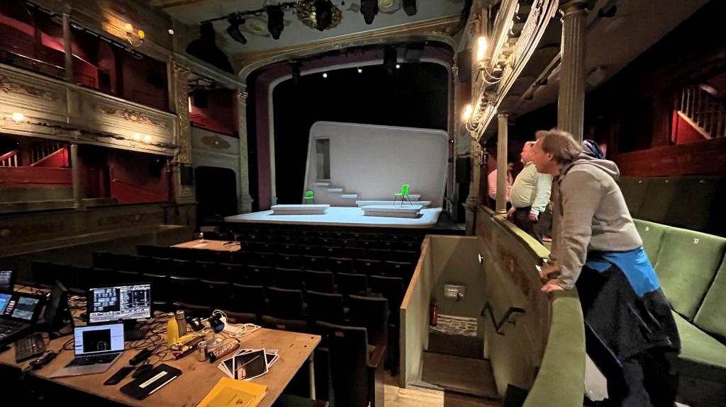 Image of inside a theatre during a technical rehearsal