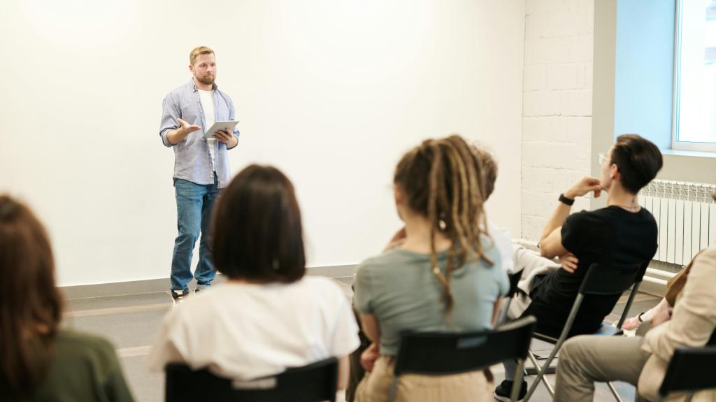 A person presenting to a room of people